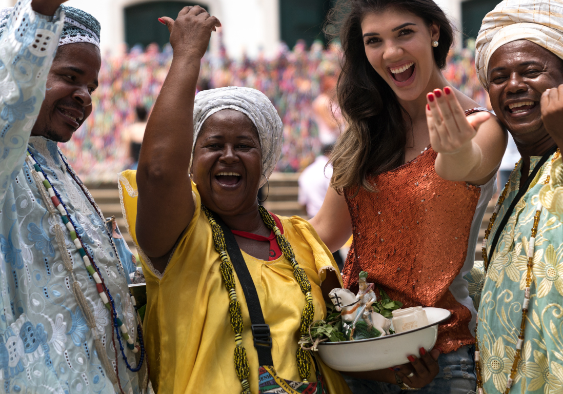 16 People making welcoming gestures to the camera.